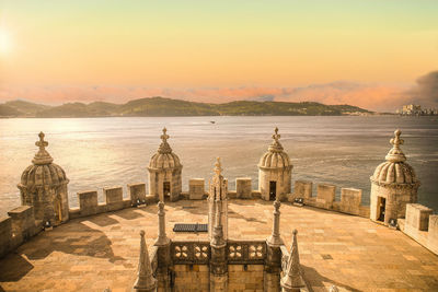 Panoramic view of buildings against sky during sunset