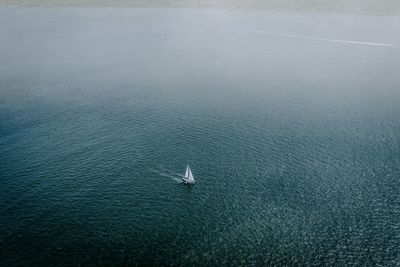 High angle view of sailboat on sea