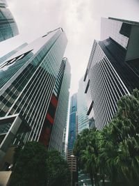 Low angle view of modern buildings against sky