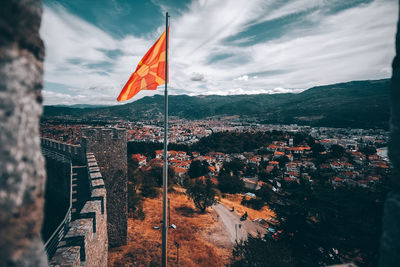 Scenic view of flag against sky