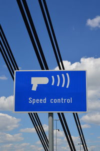 Traffic sign speed control with cloudy sky background