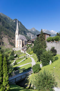 Scenic view of mountains against clear blue sky