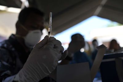 Close-up of people holding hands