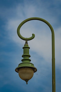 Close-up of green light against sky