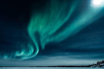 Scenic view of sea against sky at night