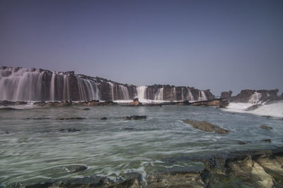 Scenic view of sea against clear sky