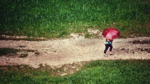 Woman standing on field