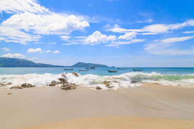 Scenic view of beach against sky