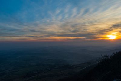 High angle view of landscape against sky during sunset