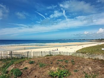 Scenic view of beach against sky