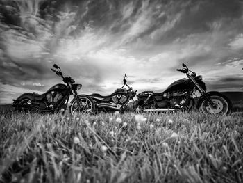 Bicycle on field against sky