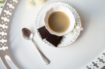 High angle view of coffee cup on table