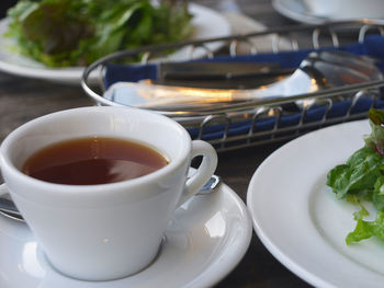 Close-up of tea cup on table