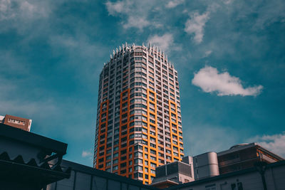 Low angle view of modern buildings against sky