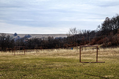 Empty field against sky