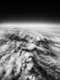 Aerial view of landscape against sky at night
