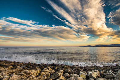 Scenic view of sea against sky during sunset