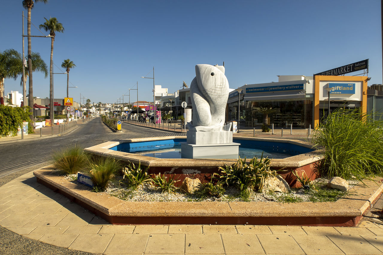 VIEW OF FOUNTAIN IN FRONT OF BUILDING