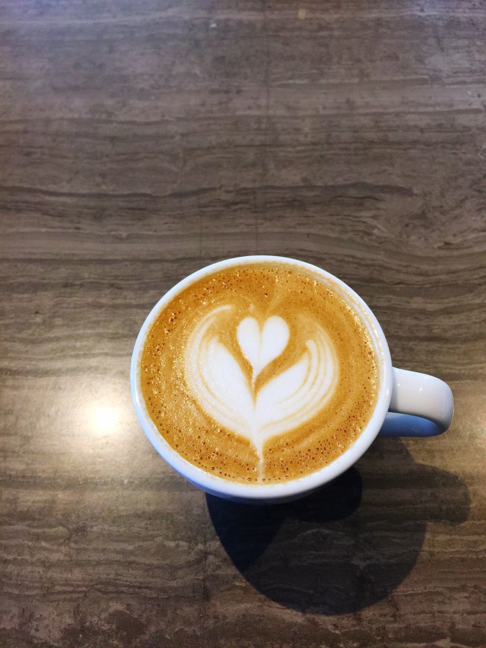 drink, coffee, cup, food and drink, refreshment, coffee - drink, mug, coffee cup, still life, frothy drink, table, froth art, hot drink, cappuccino, freshness, indoors, close-up, creativity, no people, high angle view, crockery, latte, breakfast, froth, non-alcoholic beverage