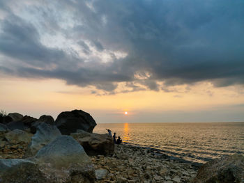 Scenic view of sea against sky during sunset