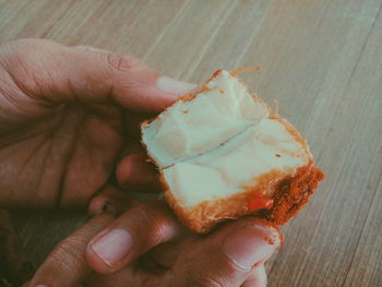 Close-up of hands holding food