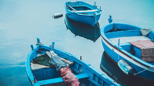 High angle view of boats moored on river