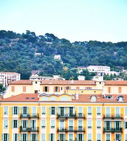 Houses against clear sky