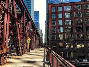 Street amidst buildings against sky
