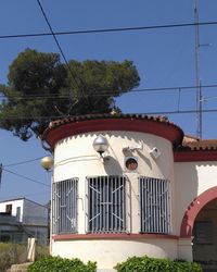 Low angle view of built structure against blue sky