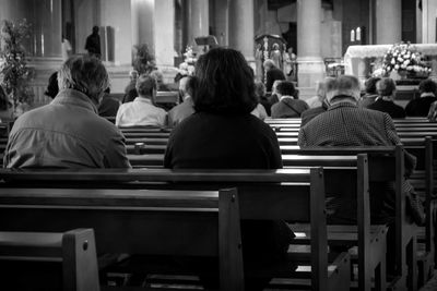 Rear view of people sitting in church