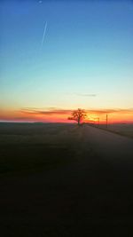 Scenic view of landscape at sunset