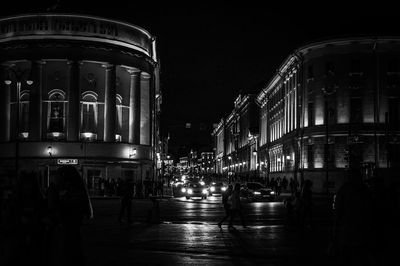 Illuminated buildings in city at night