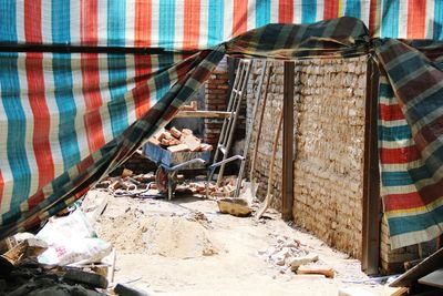 Wheelbarrow by under construction building