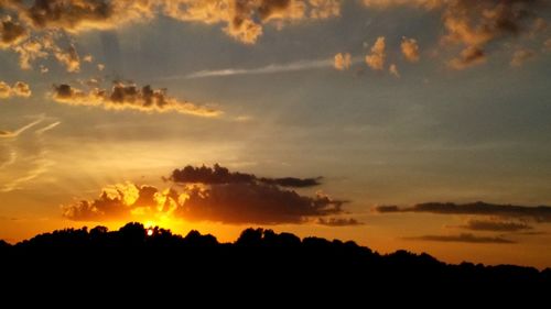 Scenic view of dramatic sky during sunset