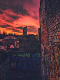 Cityscape against sky during sunset