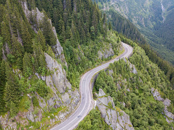 Winding road aerial view by drone. sibiu, romania. a great place to drive and stop during a trip.