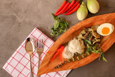 High angle view of chopped fruits on cutting board