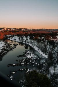 High angle view of trees against sky during sunset