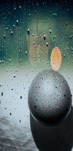 Close-up of wet glass window