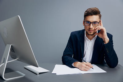 Businesswoman working at desk in office