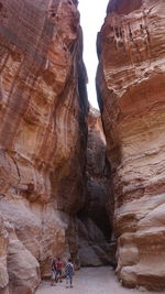 People walking on rocks