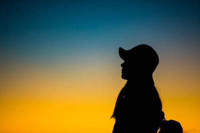 Silhouette of man at sunset