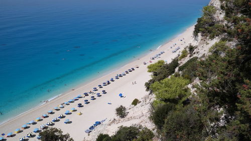 High angle view of beach against blue sky