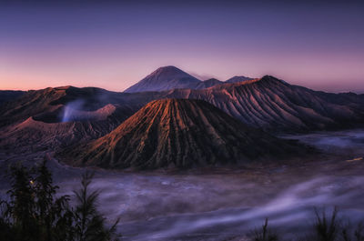 View of volcanic mountain during sunset