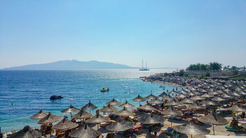 Scenic view of sea against clear blue sky