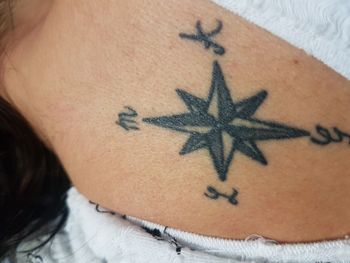 High angle view of woman painting on wall