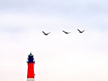 Low angle view of lighthouse against sky