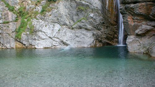 Scenic view of rock formation in sea