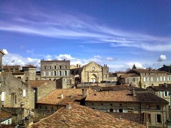 Buildings at saint emilion against blue sky