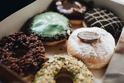 High angle close-up of donuts in box